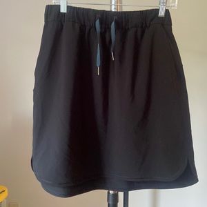 LULULEMON athletic skirt. Black. Size 10 NEVER WORN